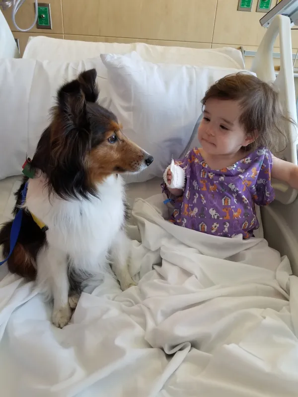 Kid Captain Millie Judge and therapy dog