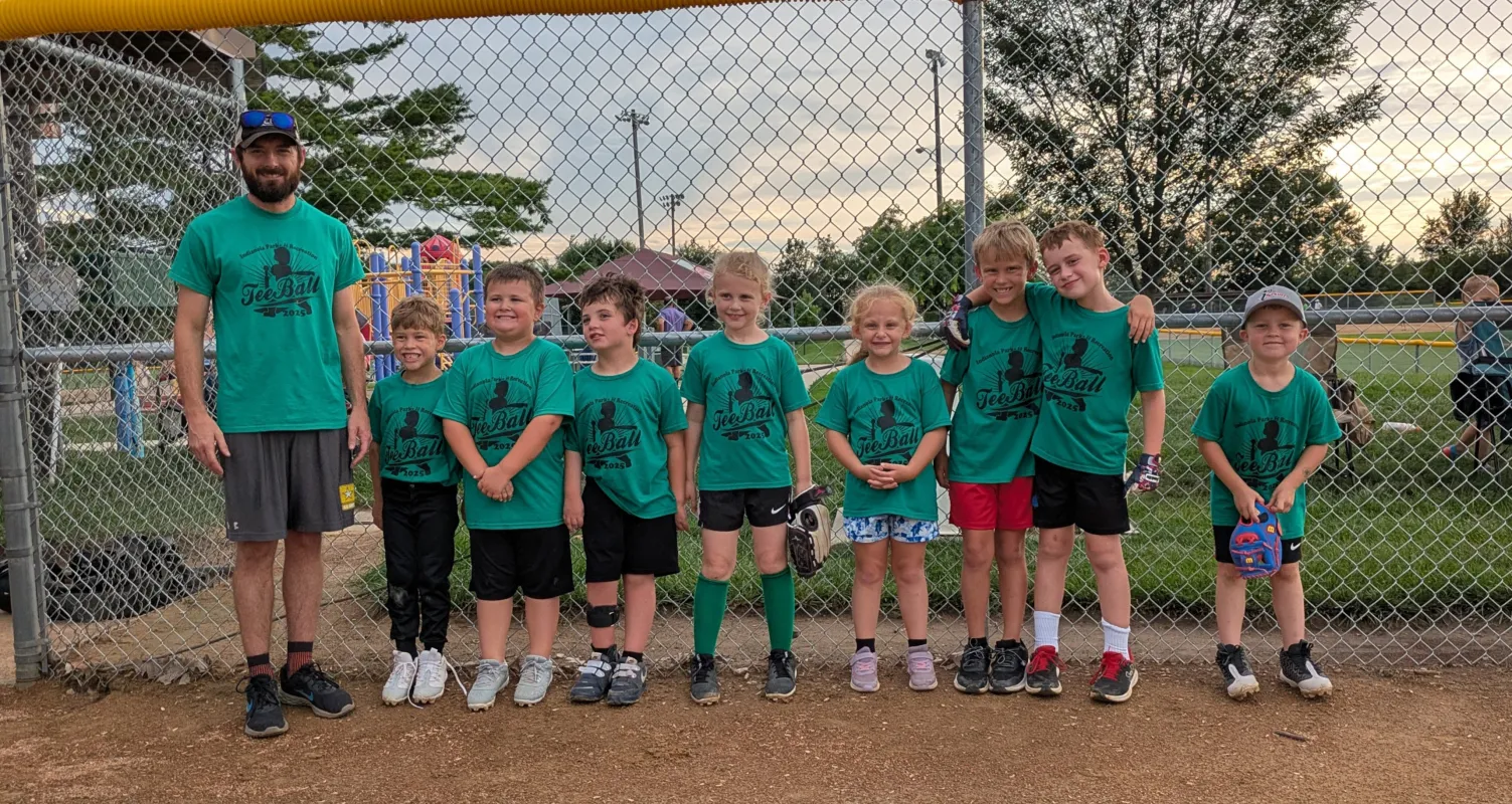 Kid captain Ray Walker and baseball team