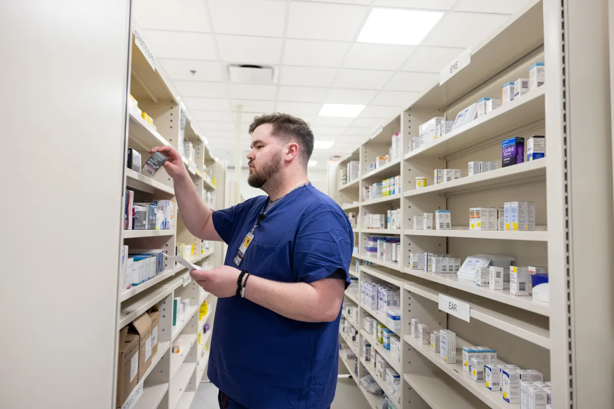 Pharmacy technician Owen Jones in the pharmacy with simulated patients at UI Health Care Medical Center North Liberty on Wednesday, Nov. 5, 2025. 