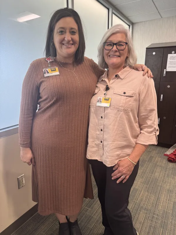 Husmann notes that colleagues like Terri Sierra (right) have shown her how patience, kindness, and teamwork can shape not only how work gets done, but how people feel while doing it.