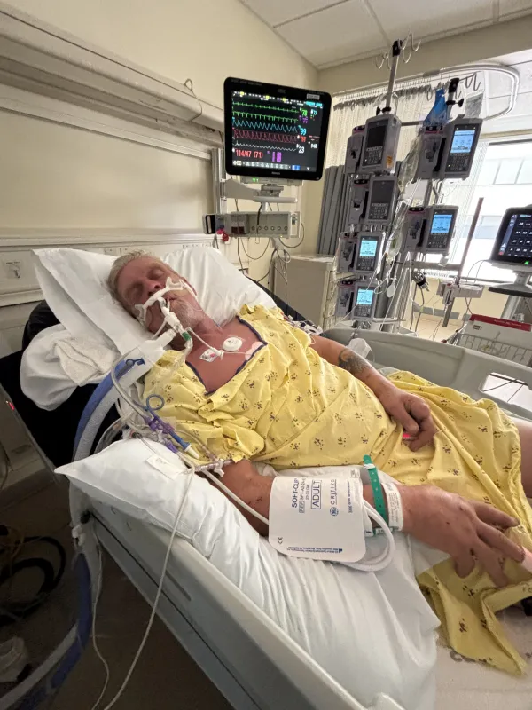 Owen Meyer on a bed in the hospital