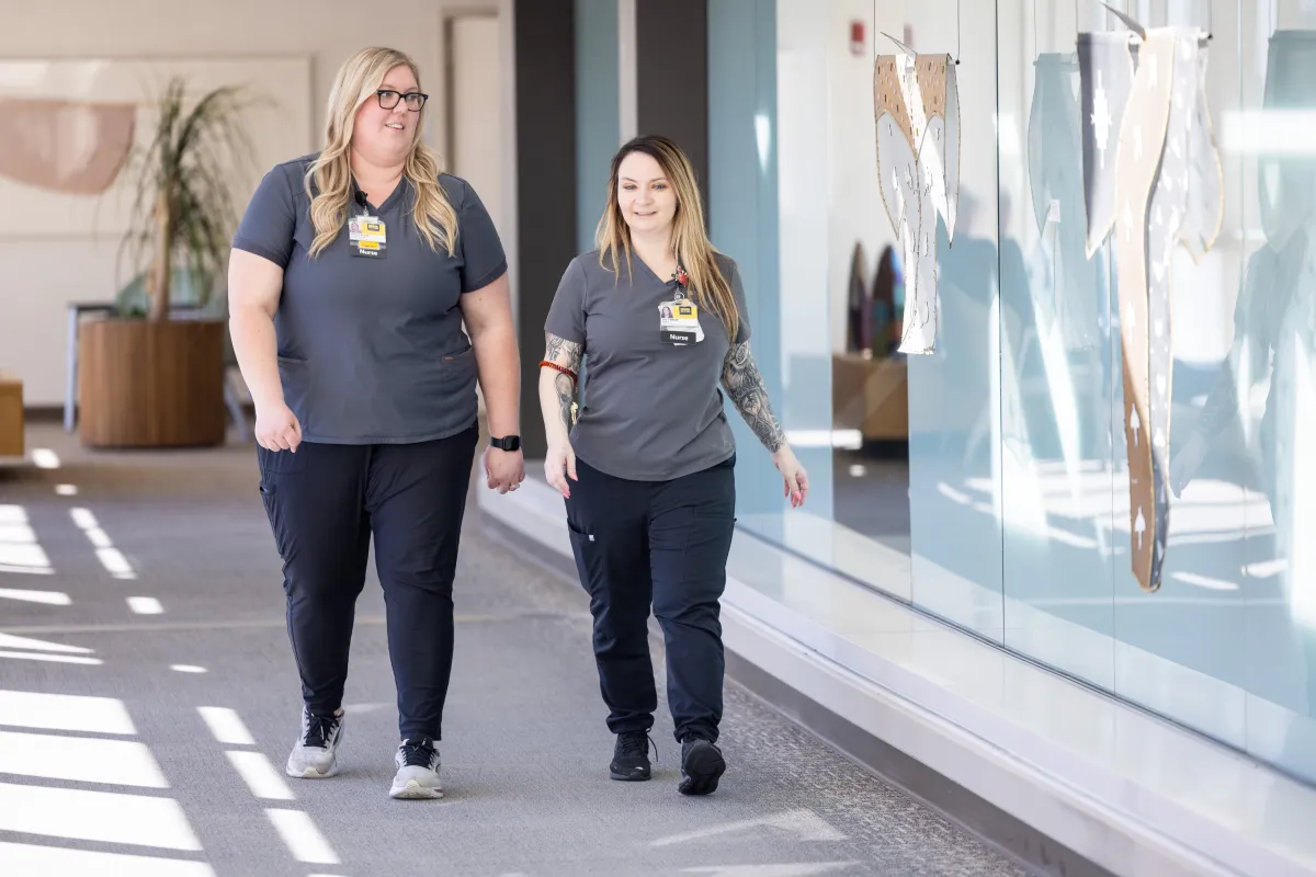 Ashley Price, an assistant nurse manager in the Behavioral Health Services division, photographed with Alexsis Lindenbusch on the UI Health Care university campus on Monday, March 9, 2026. 