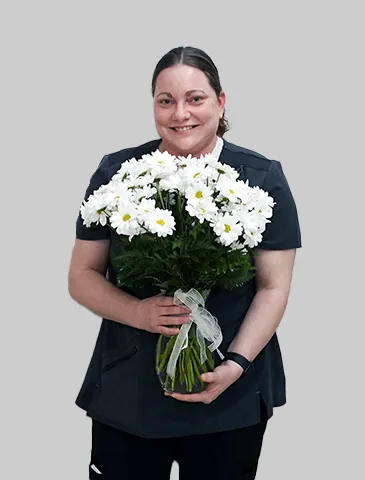 Angie Gaul, BSN, RN, receives a daisy award.