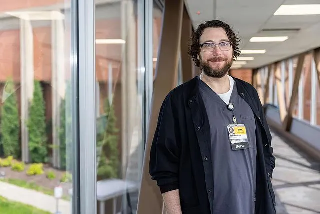 Keegan Wells, a telemetry nurse at the UI Health Care downtown medical center, photographed on Wednesday, May 22, 2024.