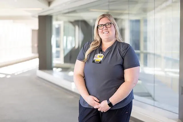 Ashley Price, an assistant nurse manager in the Behavioral Health Services division, photographed on the UI Health Care university campus on Monday, March 9, 2026.