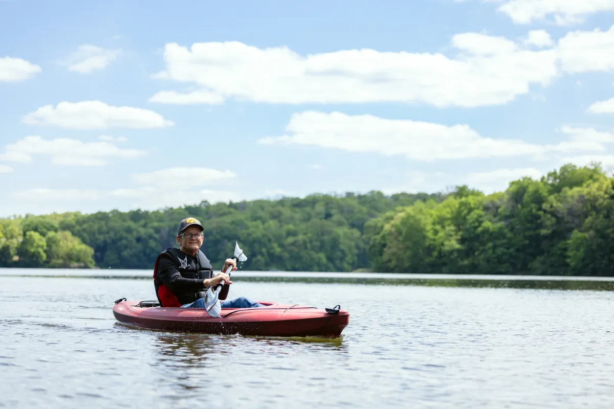 John Yoder uses a dry dock to launch his kayak at Lake MacBride on Wednesday, May 20, 2026. Yoder often kayaks at the lake with his wife and is recovering from minimally invasive cardiac surgery.