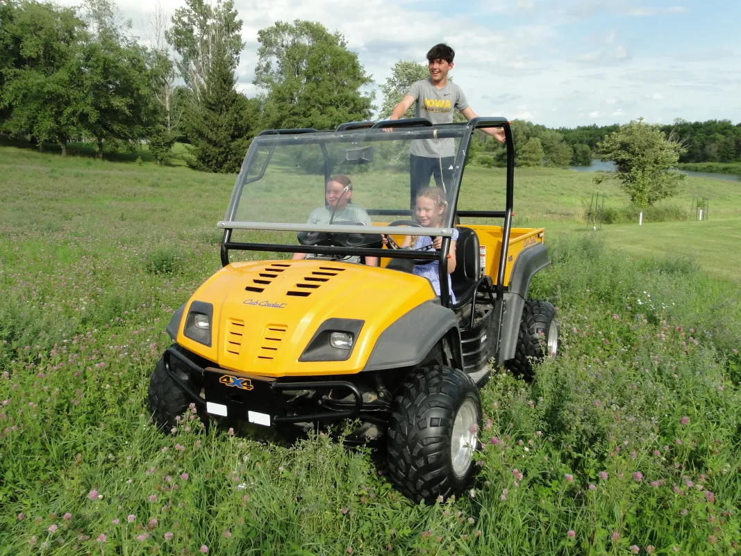 Children demonstrating improper use of UTV