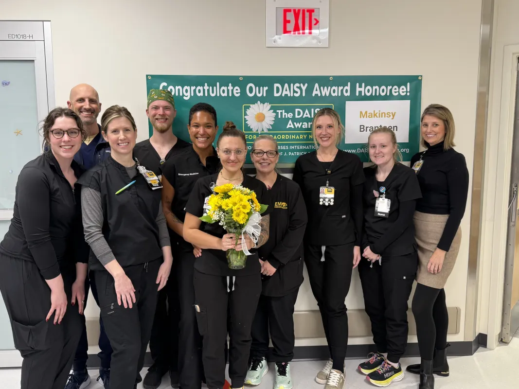 Mak (center) received a DAISY Award after a patient's parents nominated her for her compassionate care.