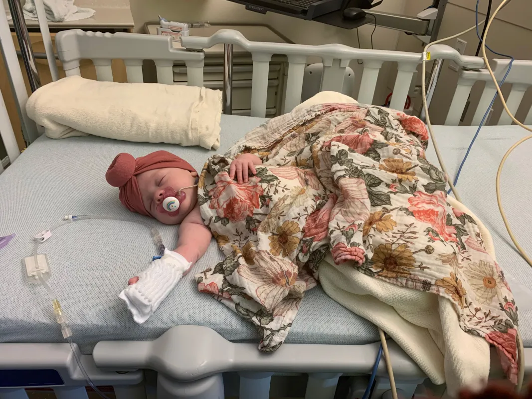 Kid Captain Harlow Taube as an infant in the hospital