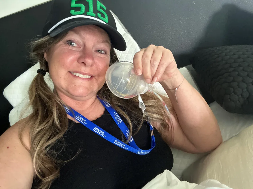 Amy Randall holding a medal