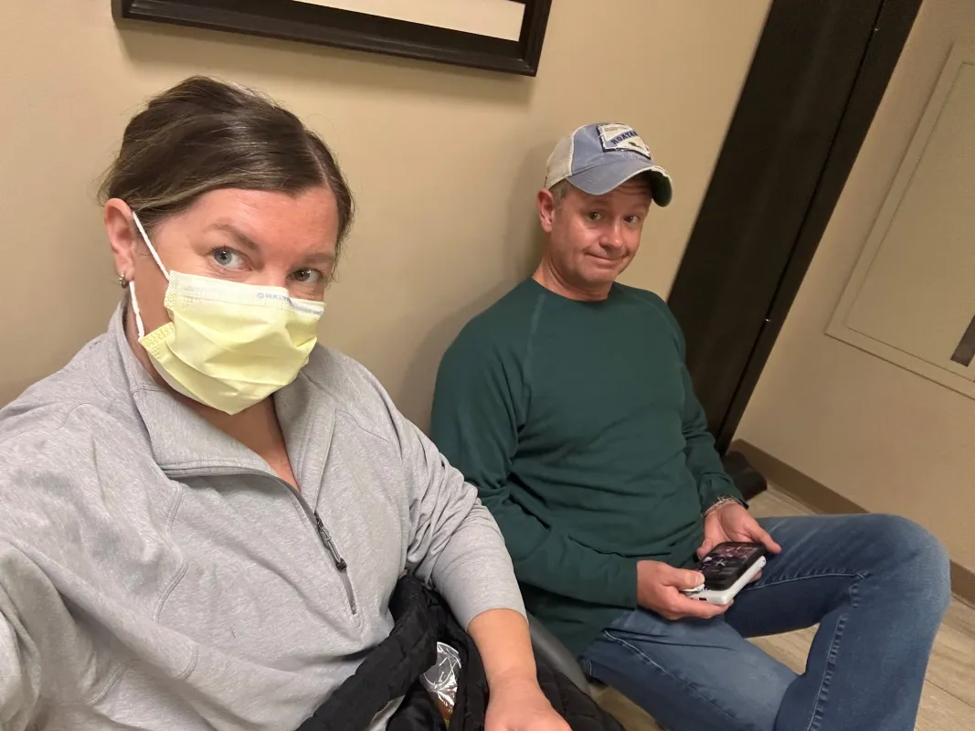 Amy Randall and husband waiting for an appointment