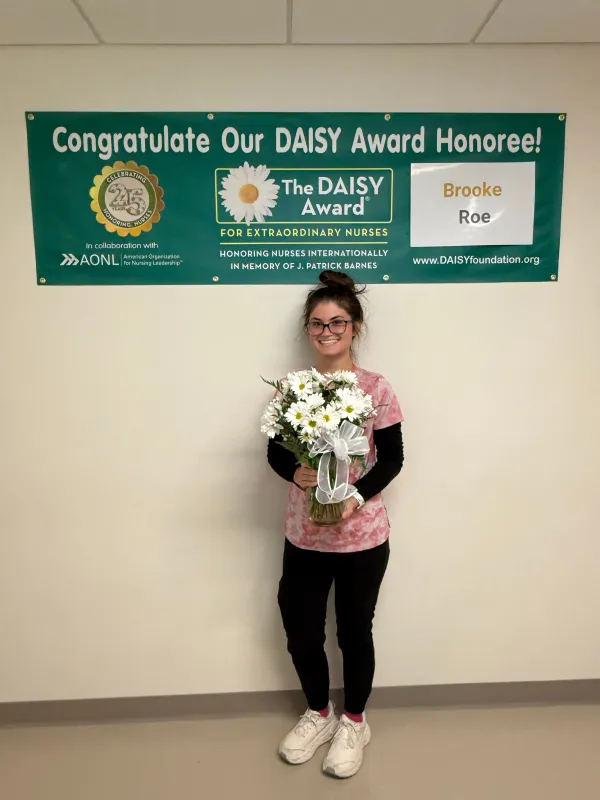 Brooke Roe, BSN, RN, accepting her DAISY Award.
