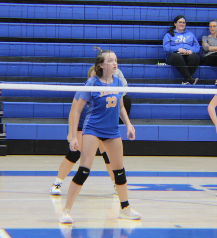 Kid Captain Kaelyn O’Brien playing volleyball