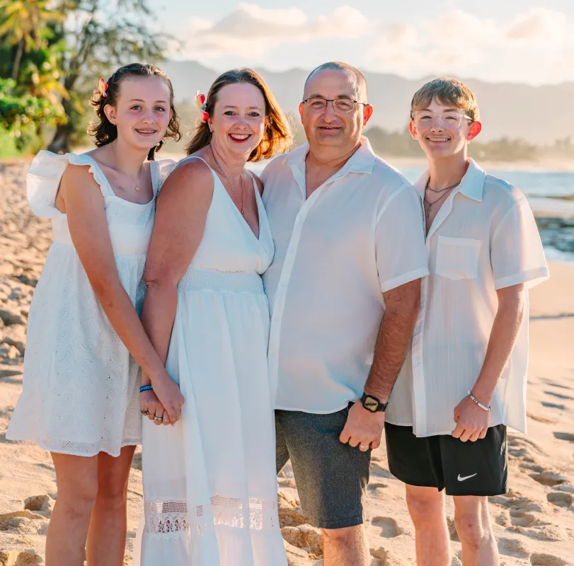 Kid Captain Kaelyn O’Brien and family on a beach