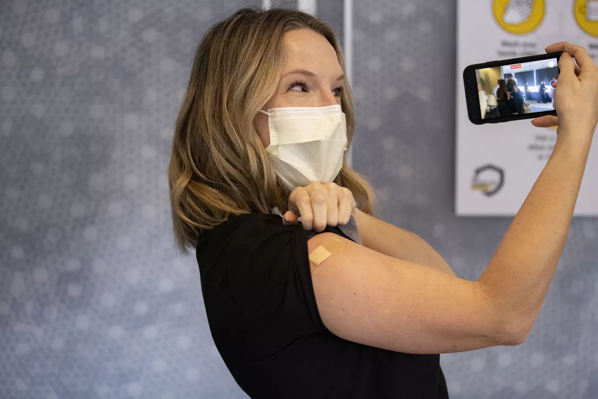 Allison Wynes takes selfie after receiving PfizerBioNTech COVID Vaccine