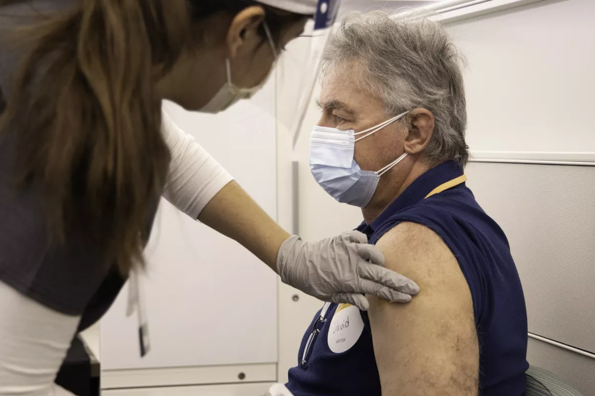 patient receiving covid vaccine