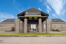 Exterior photo of the UI Health Care Coralville location on Holiday Road