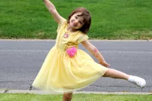 Scarlette Wheelock dancing in her yellow dress