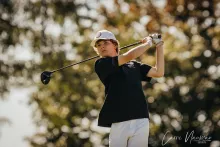 Jackson Webber posing after swinging a golf club