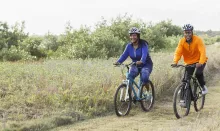 iStock of two people riding bikes