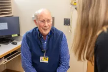 J. Lawrence Marsh, MD, with simulated ankle and knee patient in the orthopedics clinic at UI Health Care’s university campus on Tuesday, May 14, 2024.