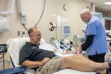 Sean McIntyre donating blood photo