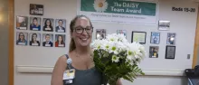 Lisa Estrada, photo with daisies