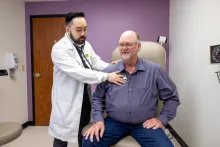 Valery Tran, MD, with simulated adult patient at the Sioux City, Pierce Street clinic on Tuesday, May 20, 2025. Patient consents on file. 