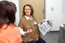 UI Health Care provider talking with a patient about bone health