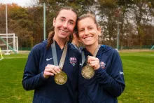 Paige Beaudry, RN, BSN and teammate on the U.S. Women’s Deaf National Soccer Team at the Deaflympics in Tokyo. Holding their gold medals