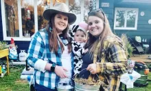 Kayla, Ashley, and Lawson Garrison dressed up for Halloween