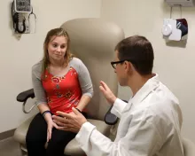 Brooklyn Wexell speaks with her physician