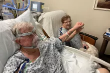 Joanne and Bill Bride hold hands at UI Hospitals & Clinics