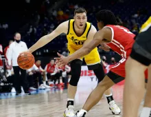 McCaffery dribbling in front of opponent