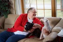Linda Sliefert at home with her dogs