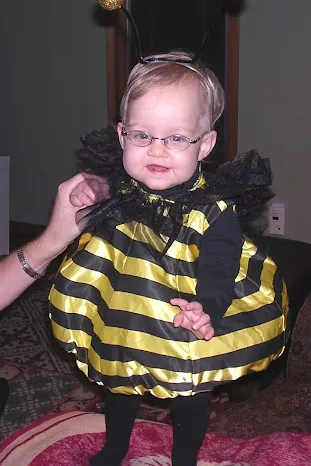 2-year-old Bridgette dressed up as a bumble bee.