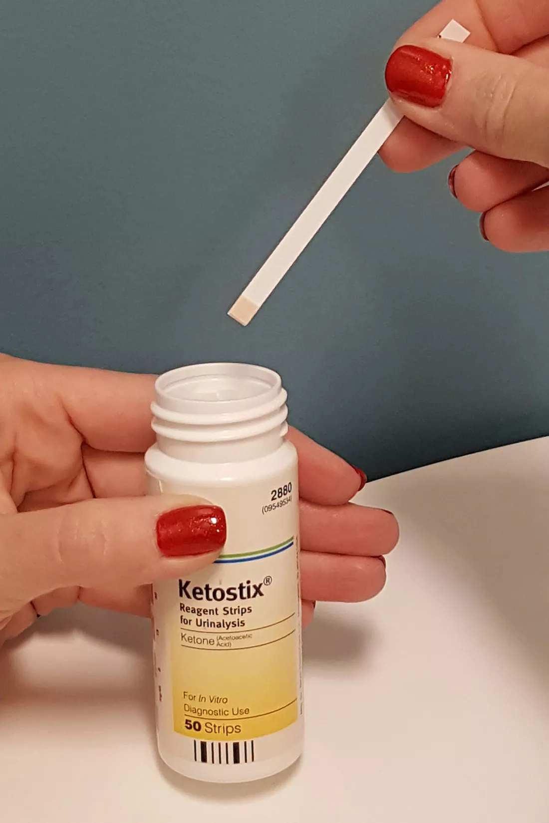 removing ketostick from bottle, photo