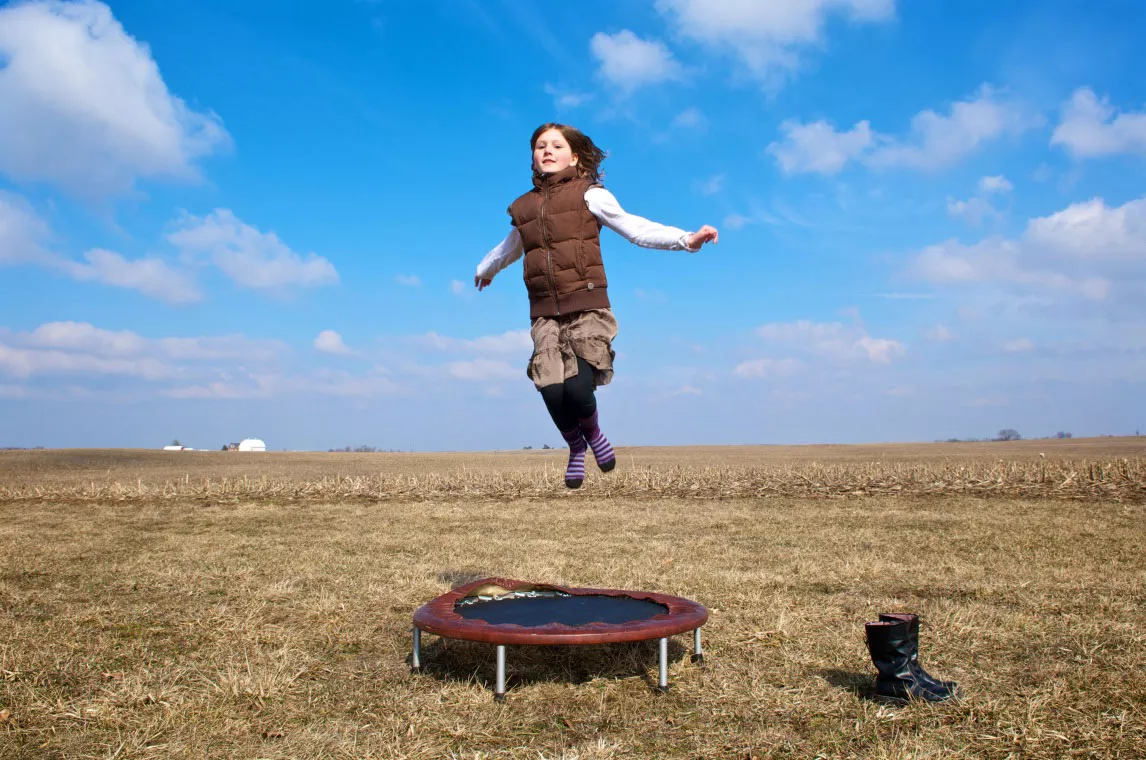 Caroline Louise Jumping Near Andrew, Iowa