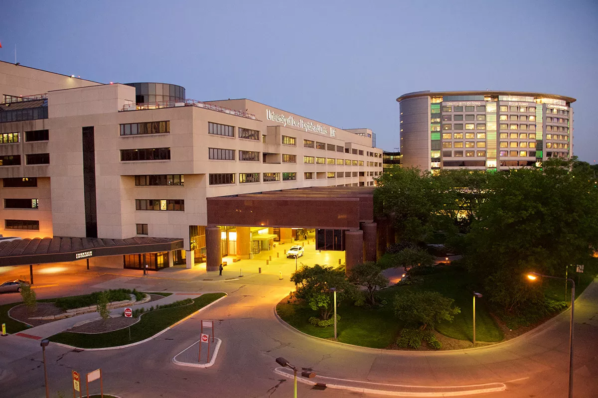 Exterior twilight view of UI Hospitals &amp; Clinics