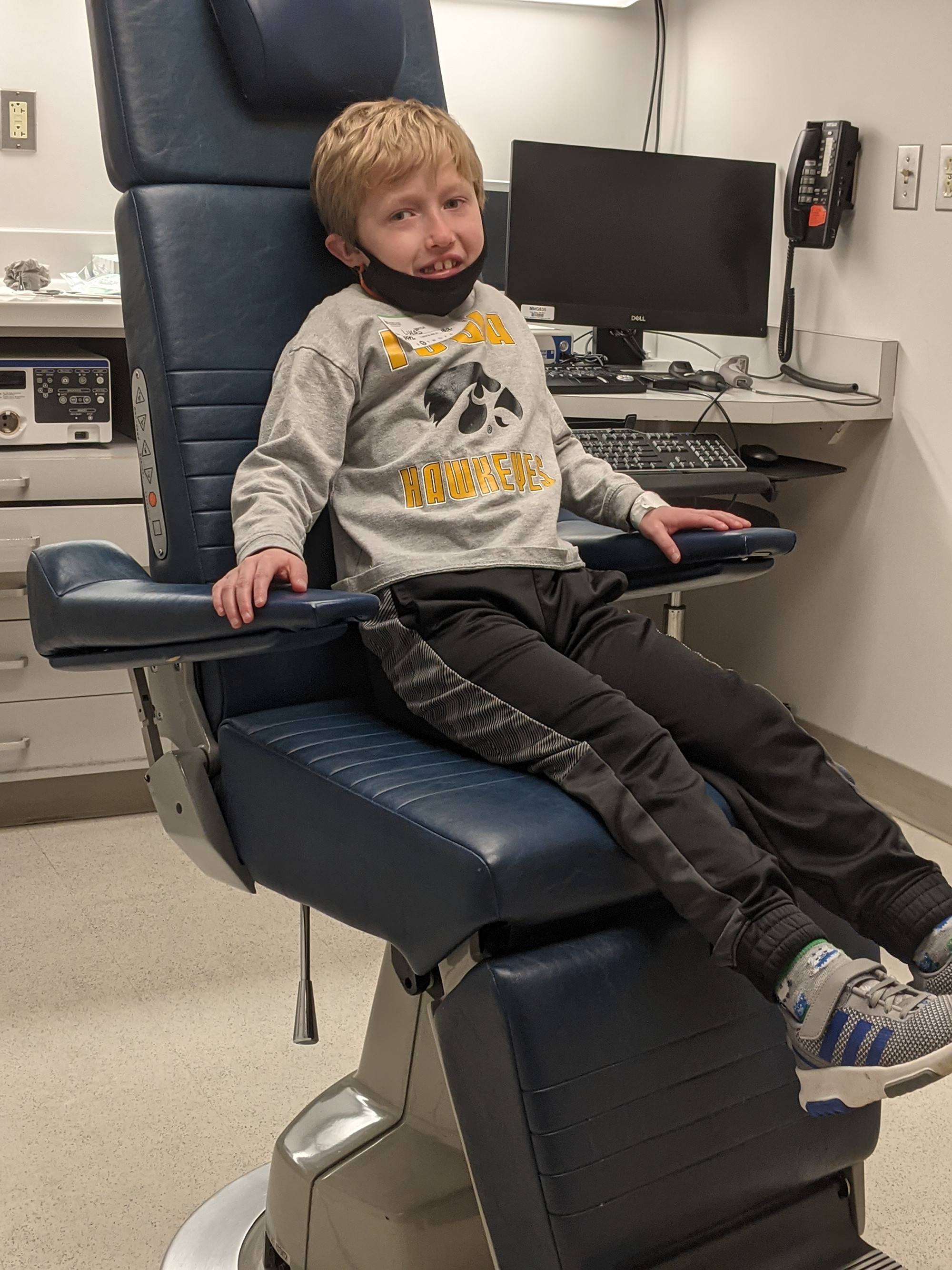 Lucas wearing black and gold for an appointment