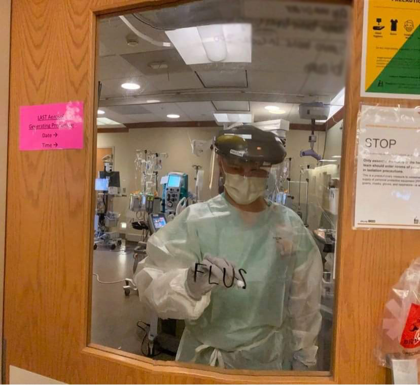 Nicholas Klein wears PPE in the Medical Intensive Care Unit